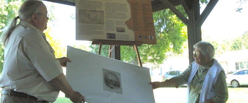 The elders in the Urban family uncovered the Sacred Ground, Flora Township marker at the Commemoration. Pictured left, Danny Urban and his 94 year-old great aunt, Sylvia Urban.