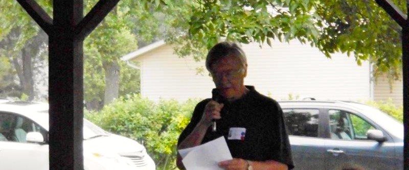 Don Tolzmann dedicating the plaques
